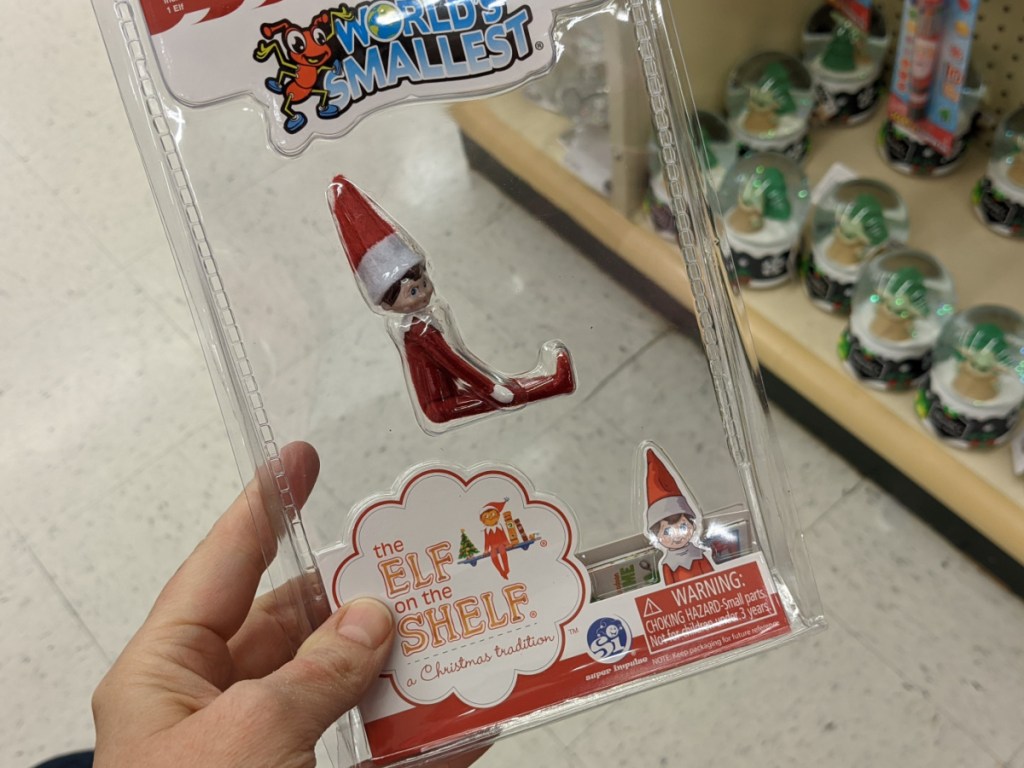 hand holdng the worlds smallest elf on the elf at hobby lobby