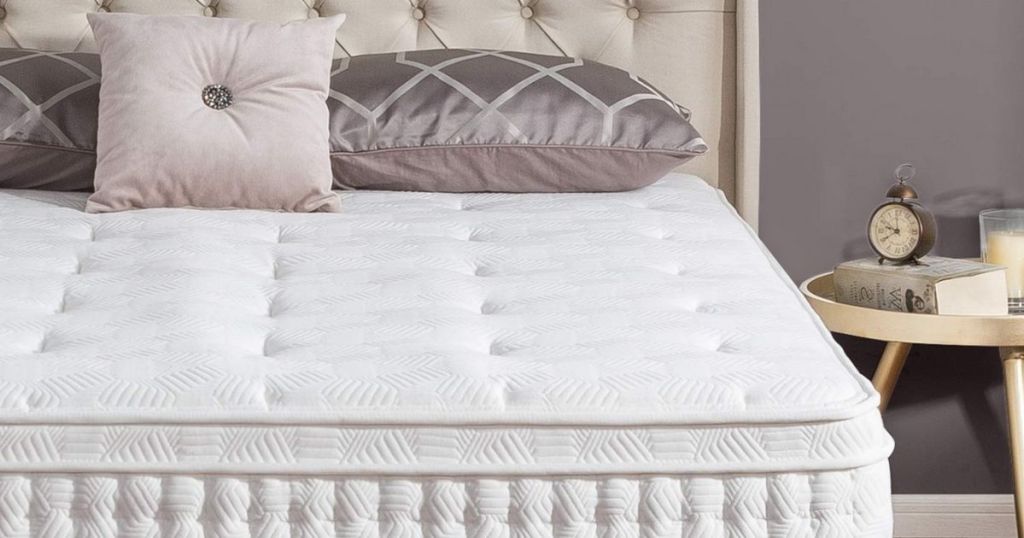 Zinus mattress with pillows and nightstand