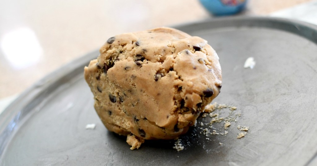ball of cookie dough on pizza pan