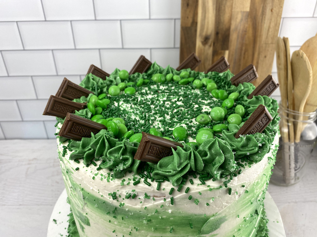 candy cake with frosting and chocolates 