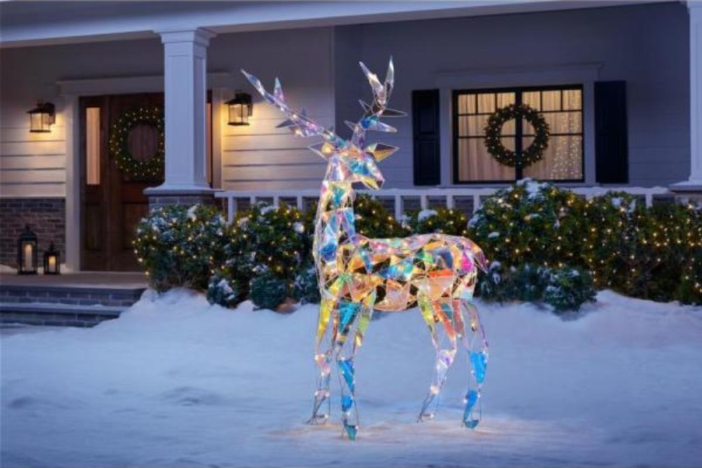iridescent reindeer lit up in yard