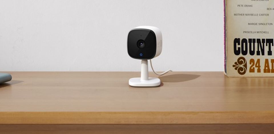indoor security camera on a shelf