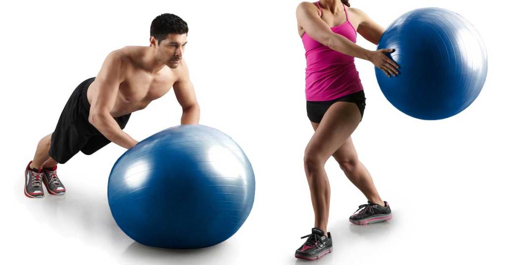 man and woman using balance balls