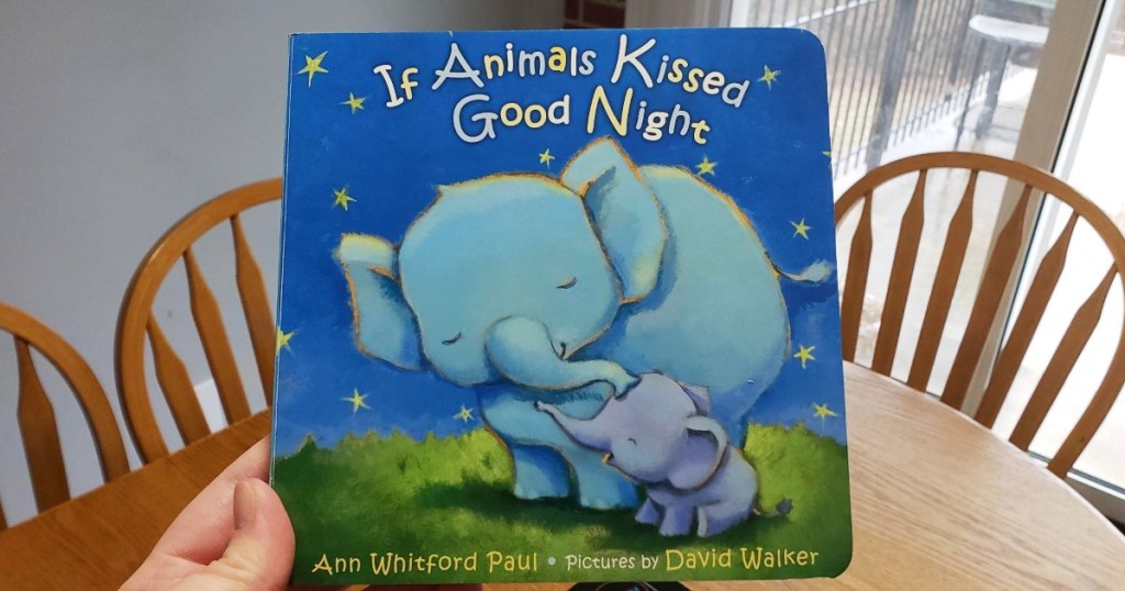 holding If Animals Kissed Goodnight board book
