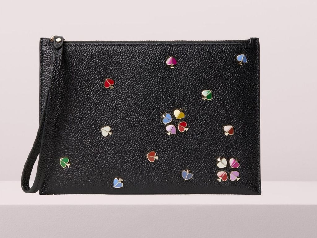 Kate Spade black crossbody with colorful emblems