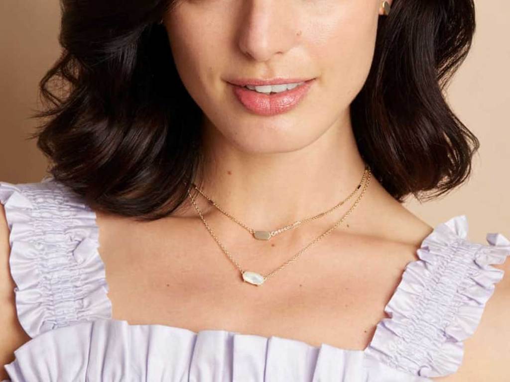 model wearing necklaces