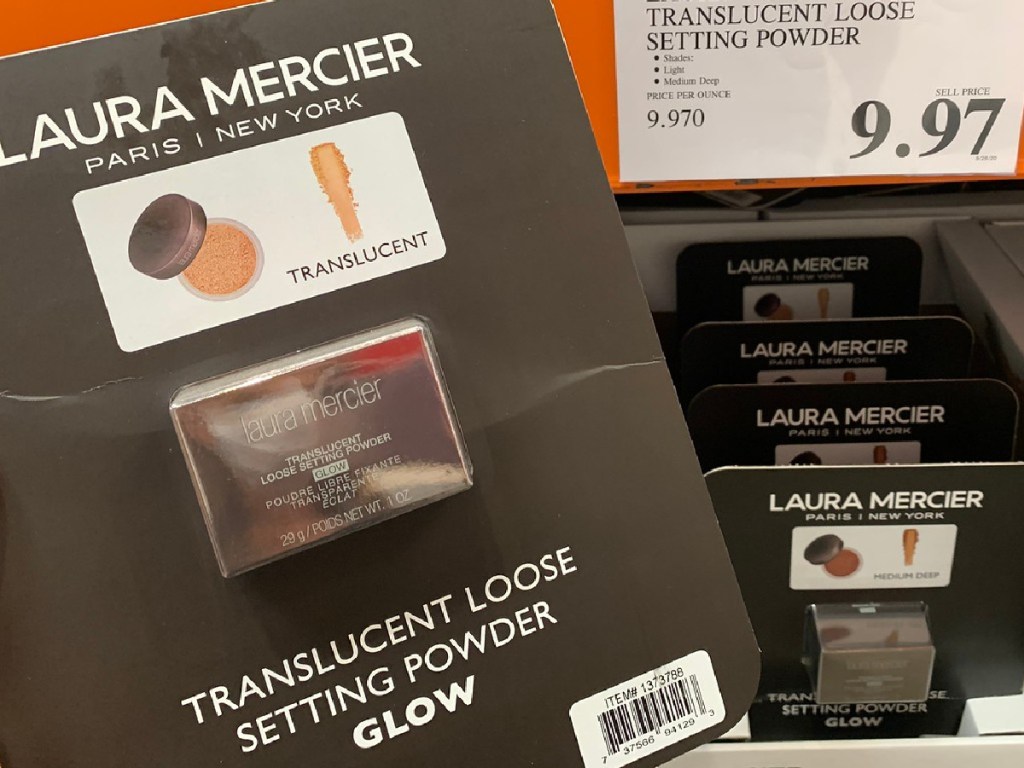 package with make up being held by price sign in store