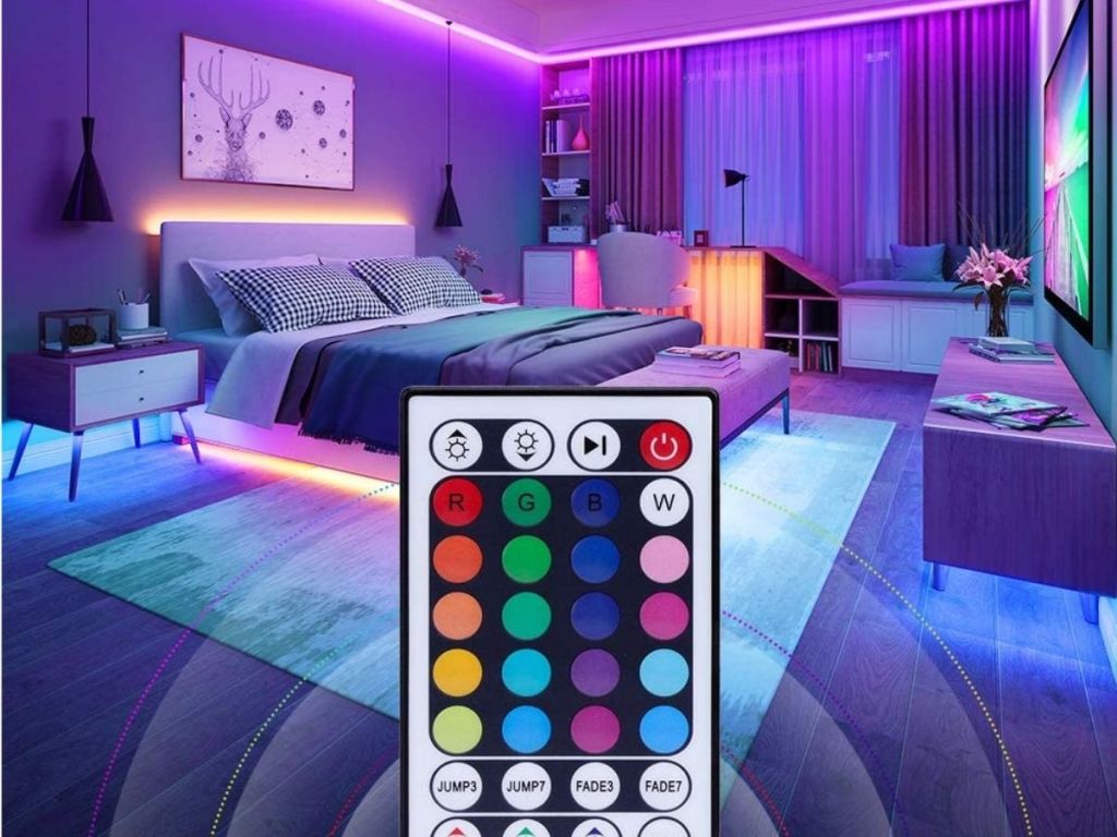 bedroom with color lighting and remote