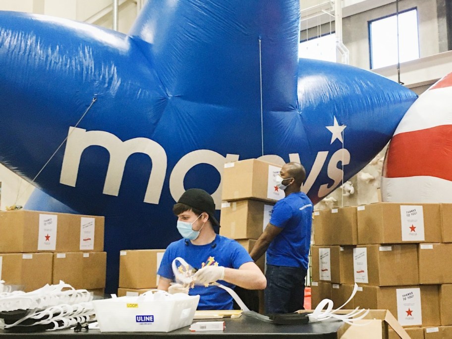 masked workers inside Macy's warehouse