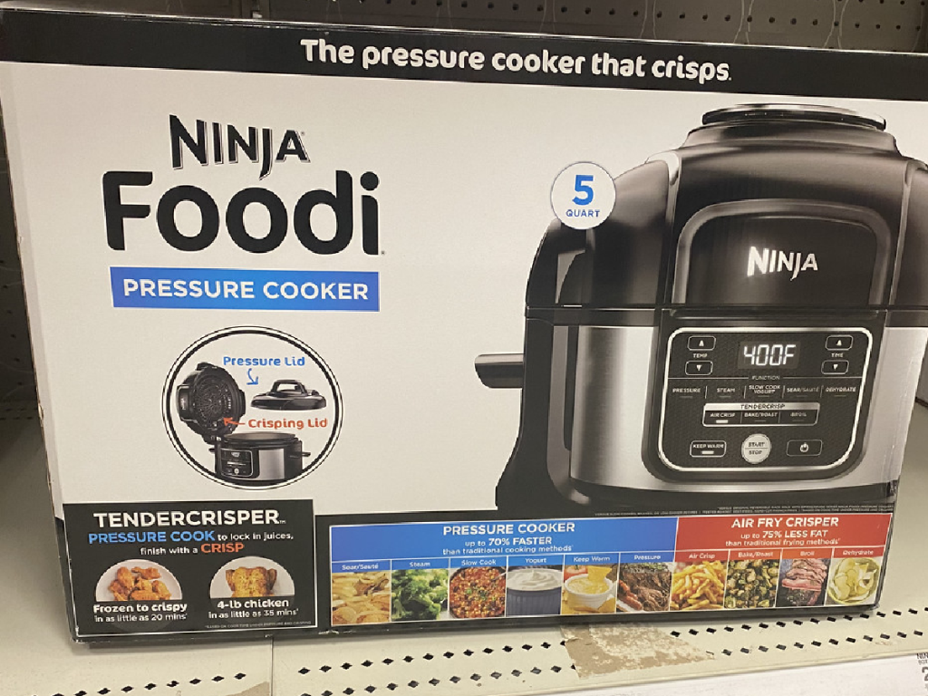 large box on store shelf with a pressure cooker in it