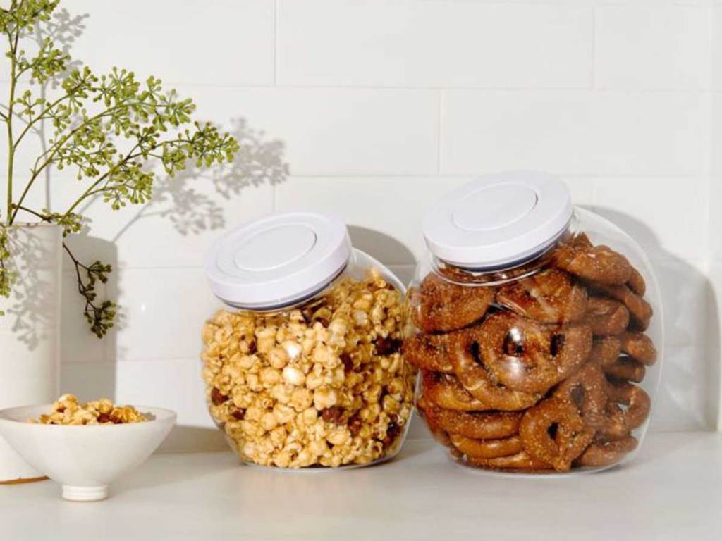 clear cookie jars on a table