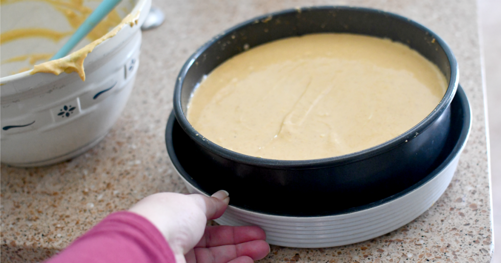 placing cheesecake pan inside a larger cake pan