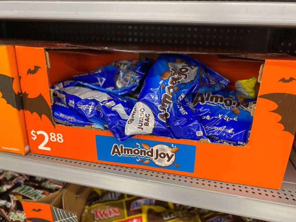 box with bags of Almond Joy candies