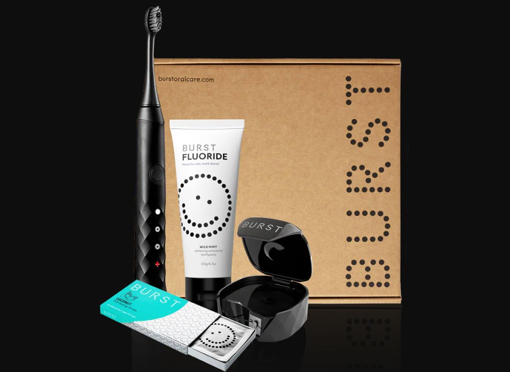BURST starter kit with matte black toothbrush, floss, toothpaste, and whitening strips