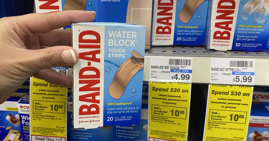 Hand holding band-aids