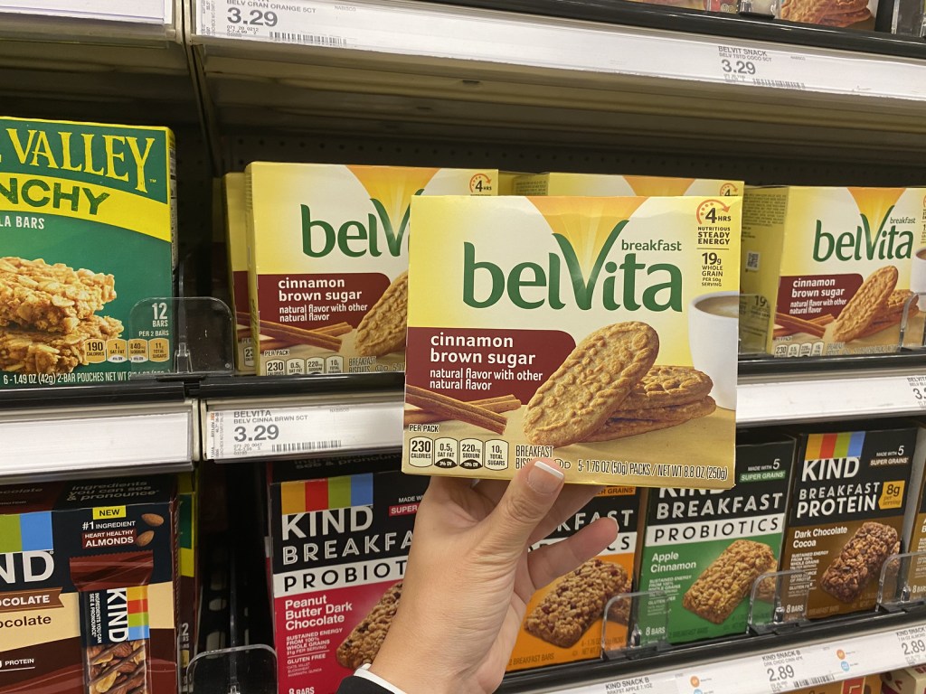 hand holding up Belvita Biscuits on Target Shelf