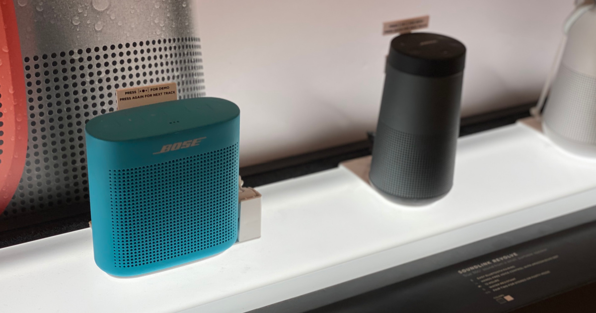 two speakers on shelf 