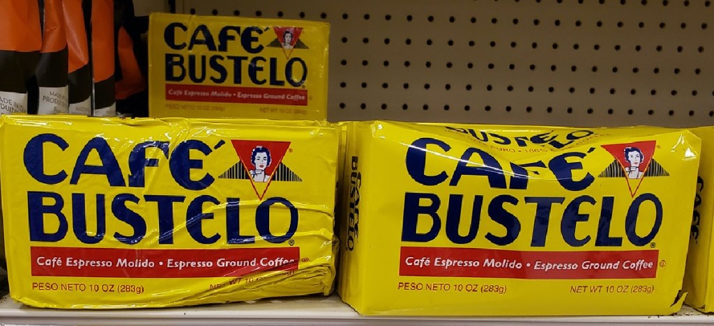 packs of ground coffee on store shelf