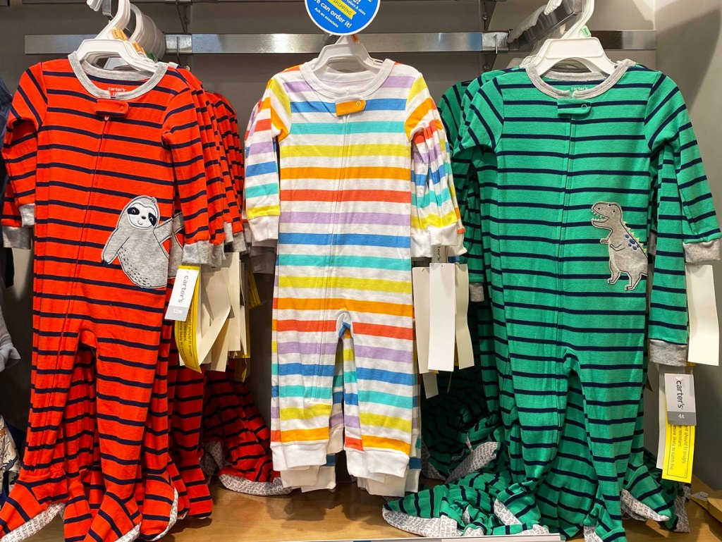 carter's boys sleep and play sets on hangers on store display