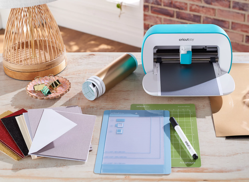 Cricut Joy and accessories on a table