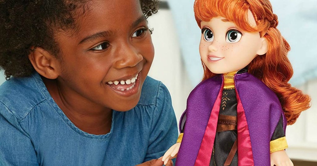 Disney Frozen 2 Anna Travel Doll and little girl