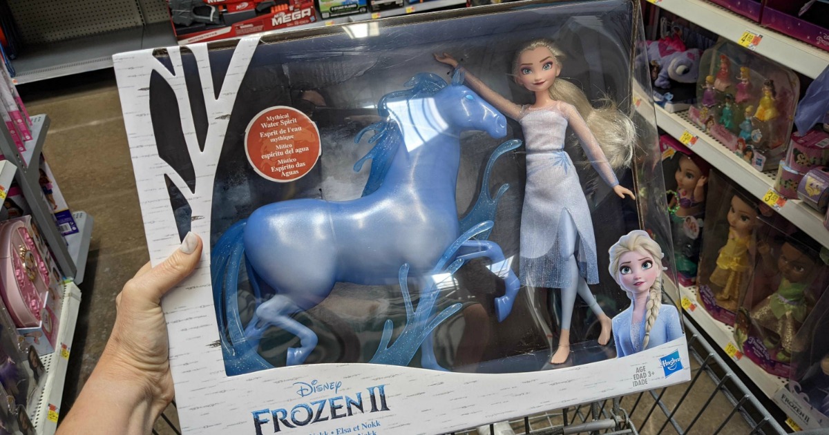 Doll and toy horse in packaging