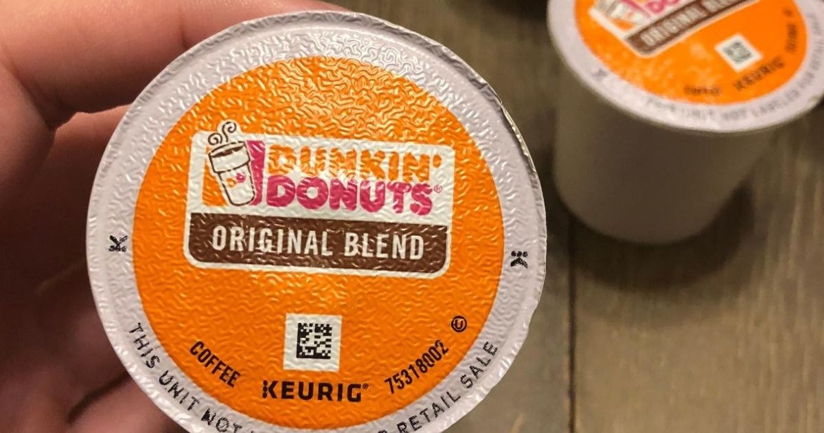 Hand holding a Dunkin Donuts K-Cup