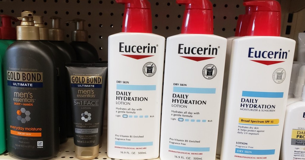 multiple bottles of eucerin lotion sitting on a store shelf