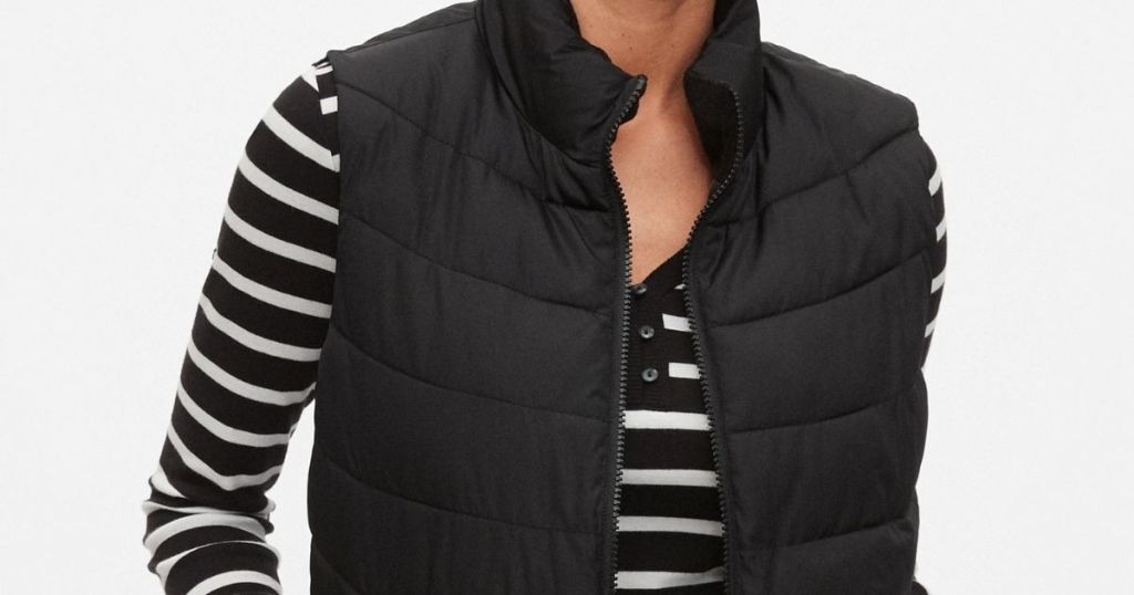 woman wearing a black puffer vest