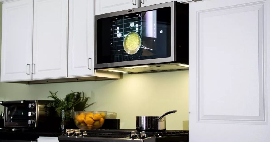 GE Profile Smart Range Hood in white kitchen