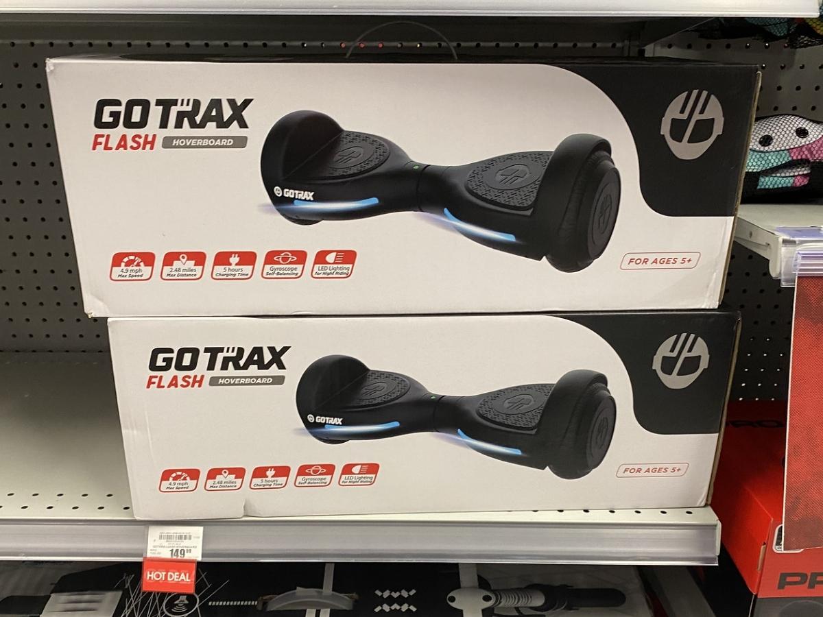 gotrax black hoverboards in box on store shelf