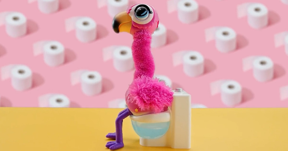 Small pink flamingo toy on toy potty