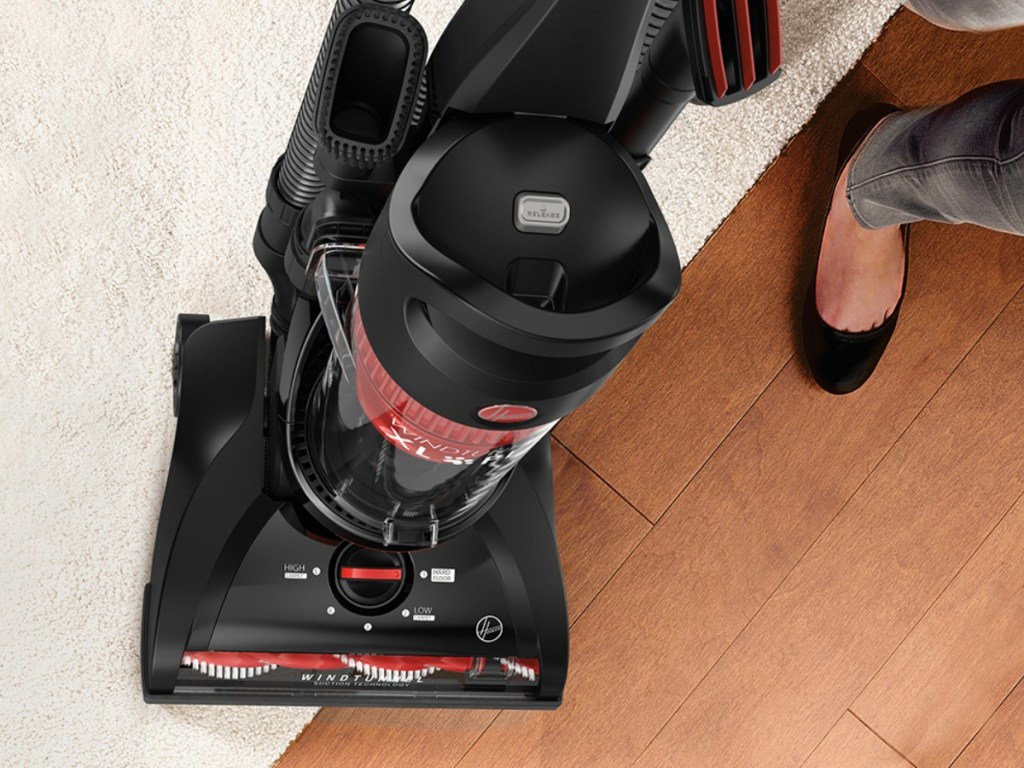 Woman vacuuming stairs