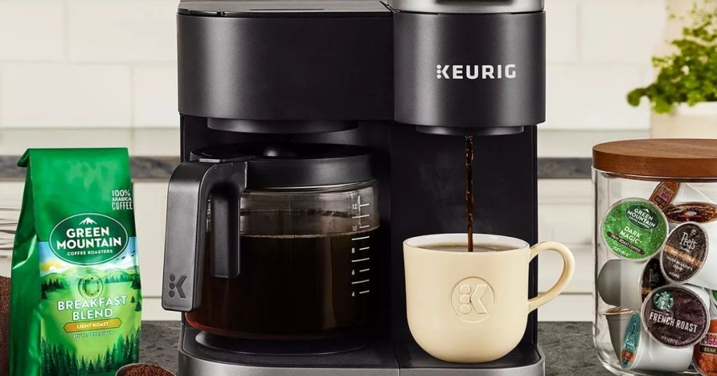 Keurig Duo coffee maker with coffee next to it