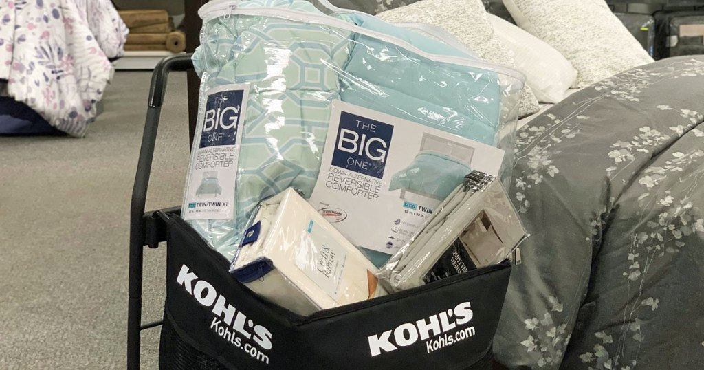 black kohl's shopping cart filled with bedding items