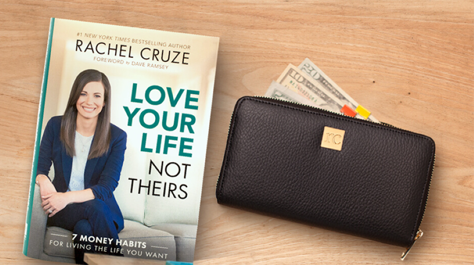 Love Your Life Not Theirs book next to a wallet
