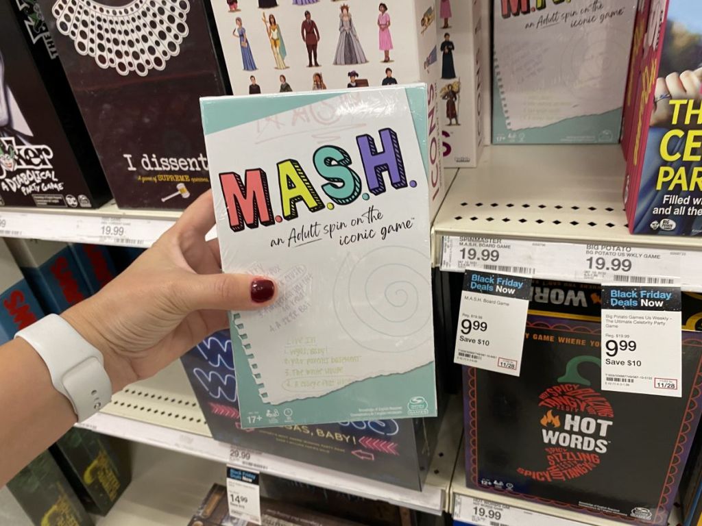 hand holding the MASH Card game