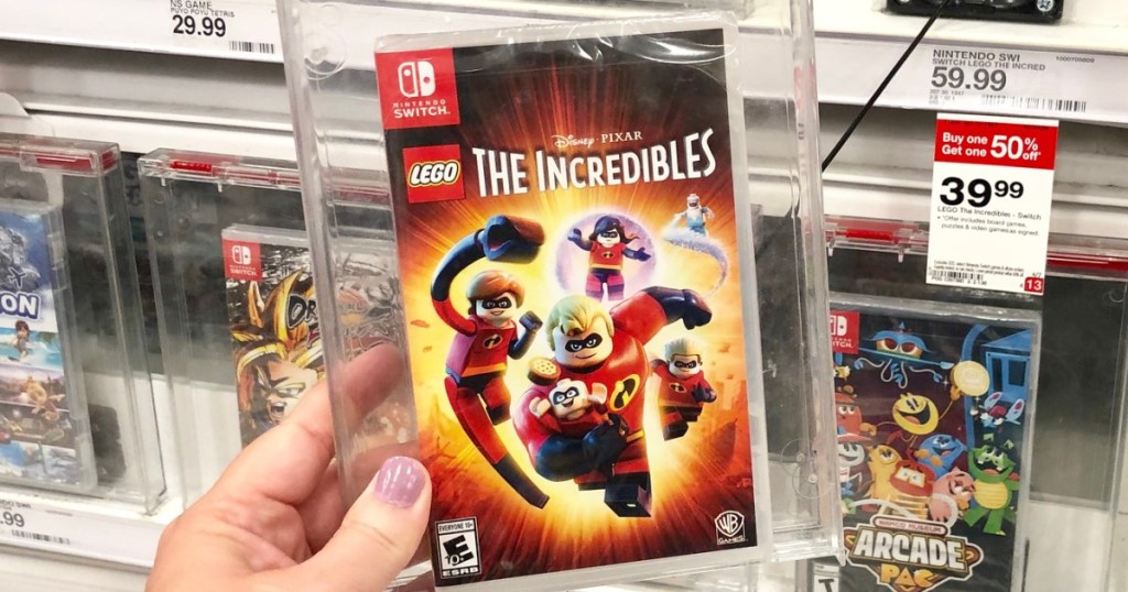 hand holding the incredibles nintendo switch video game