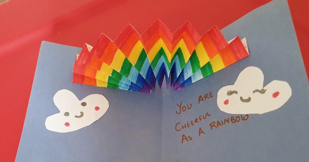 inside of popup rainbow card