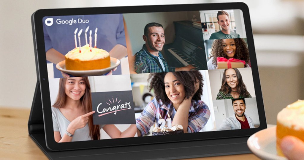 people on a google duo call on the screen of a black samsung galaxy tablet