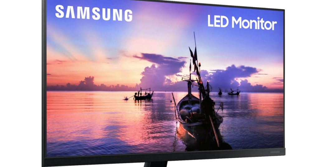 samsung computer monitor with boats at sunset on screen