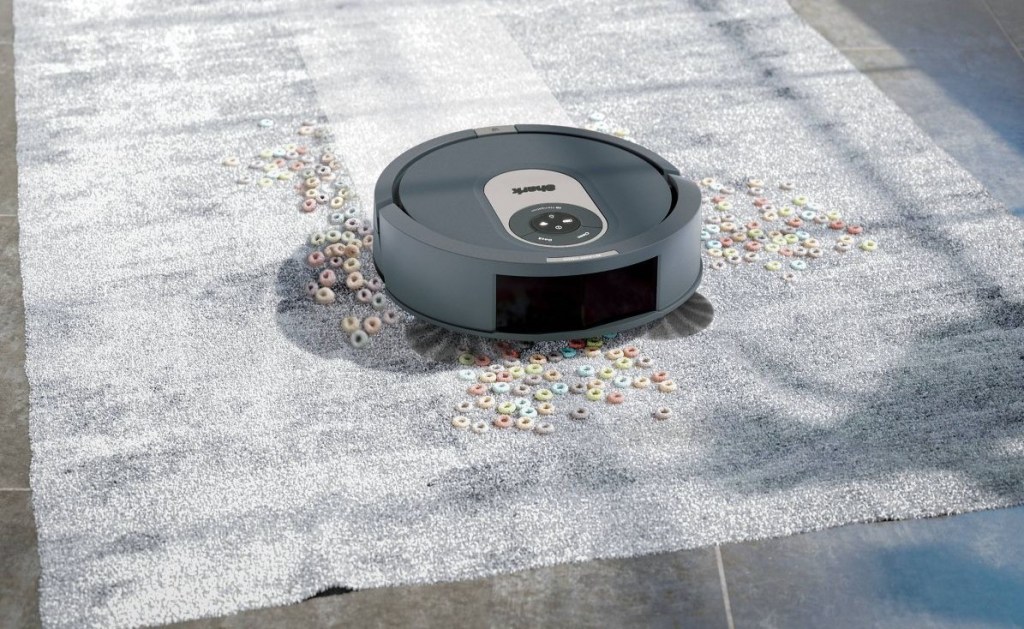 robot vacuum cleaning up cereal