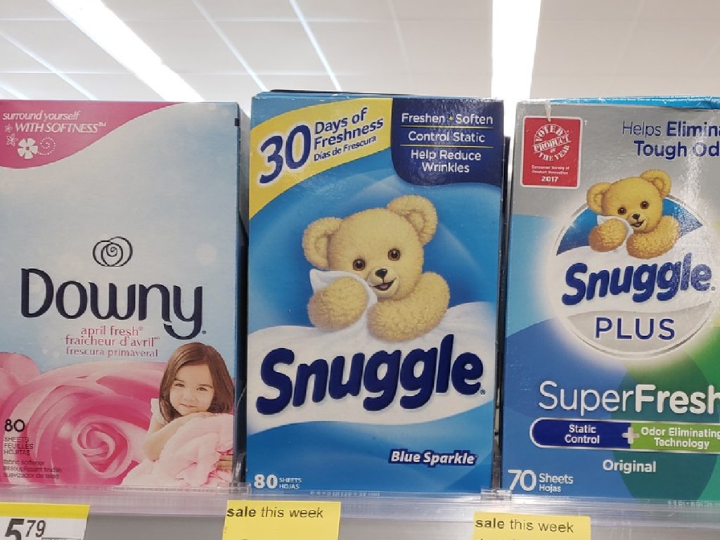 multple boxes of snuggle fabric softener on a store shelf