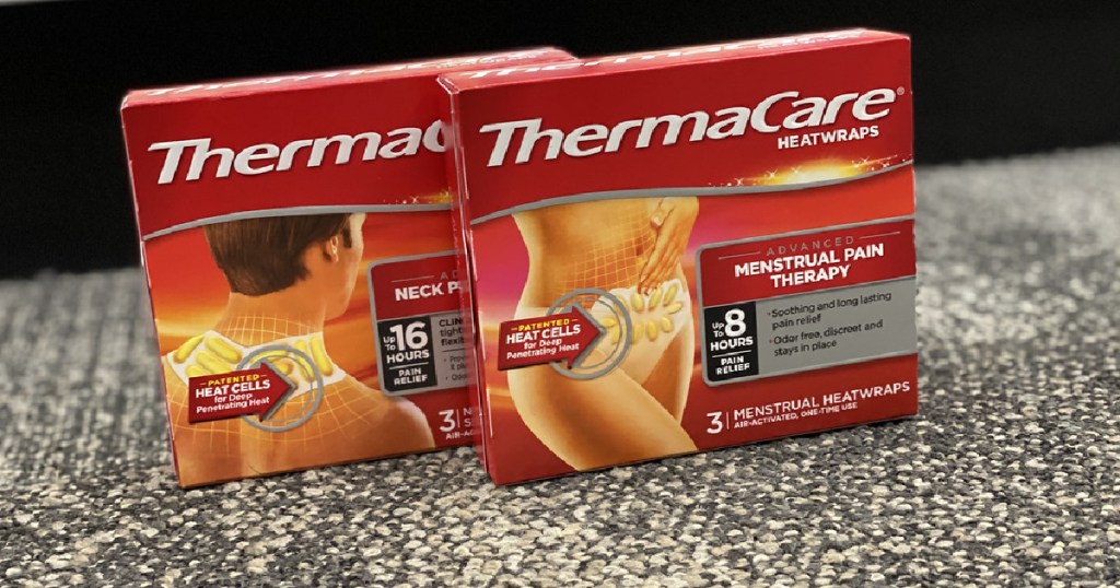 box of neck heatwraps and menstrual heat wraps on carpet