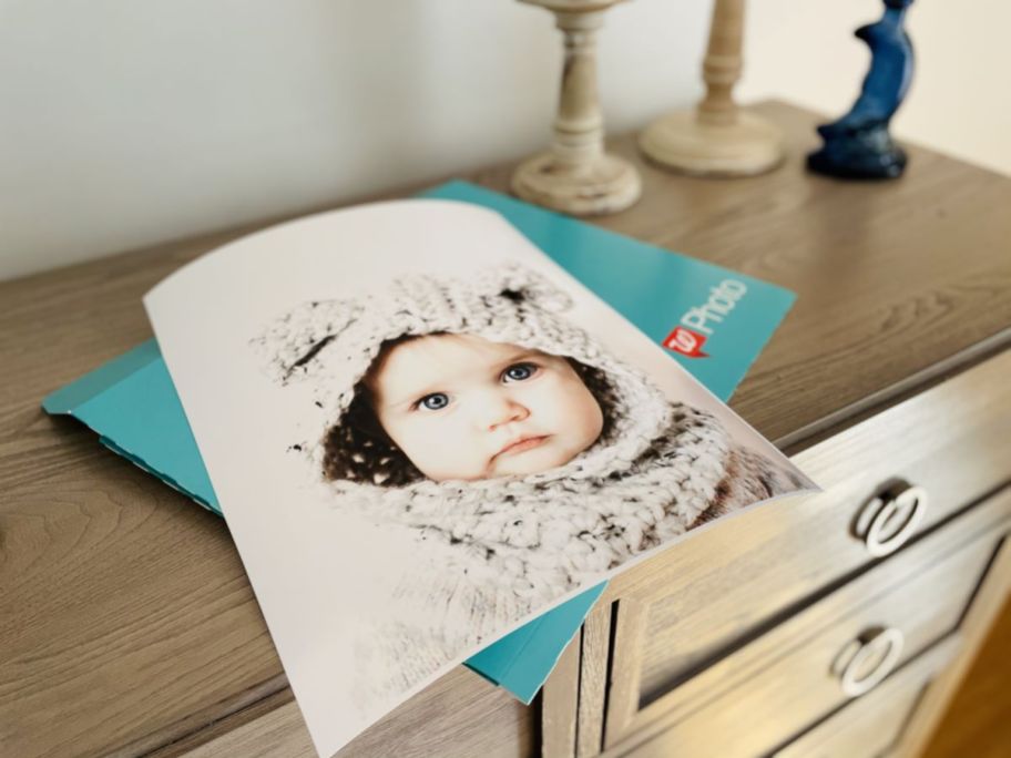 photo of a baby on a nightstand