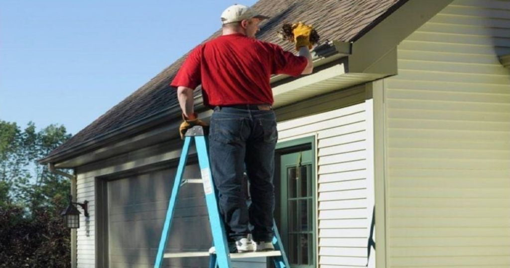 man outisde on 8-ft. Werner ladder