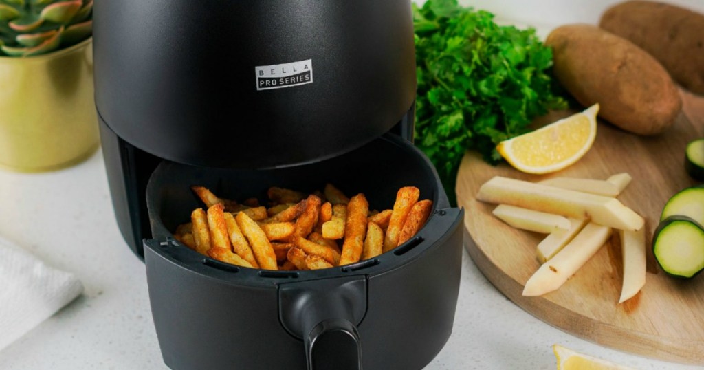 air fryer with fries in its basket