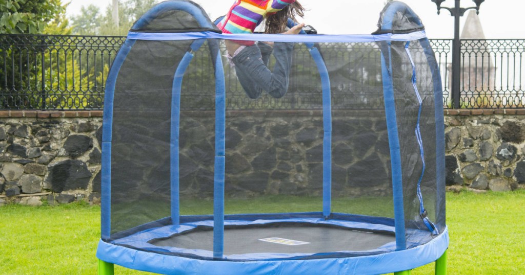 little girl jumping on bounce pro trampoline