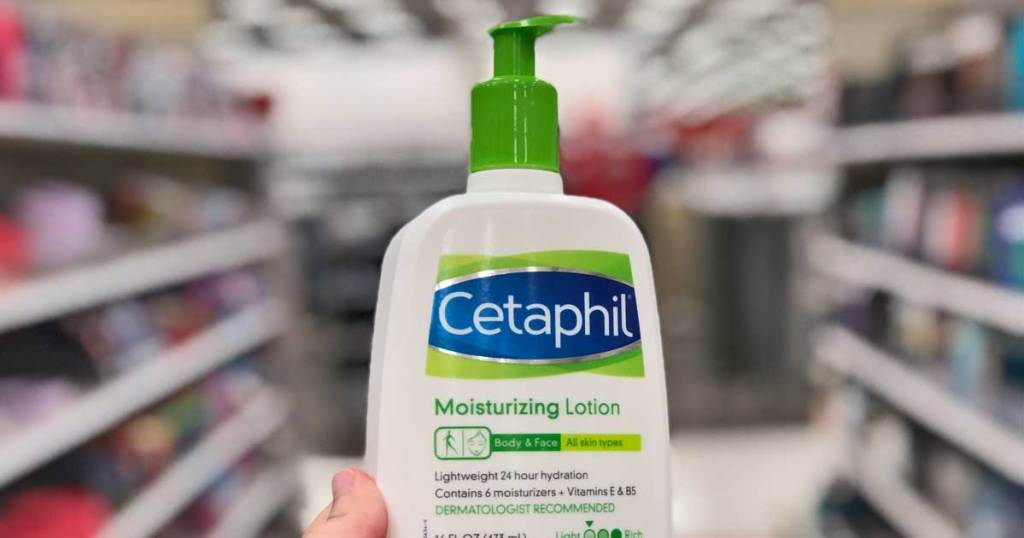 hand holding cetaphil lotion