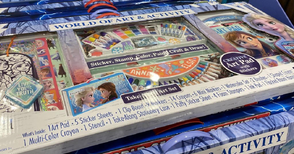 large box with markers and crayons in it on store display